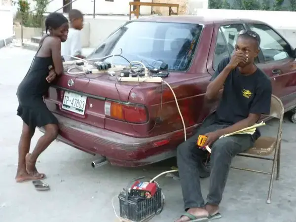 4830679-charging_cell_phones_on_a_car_battery-0